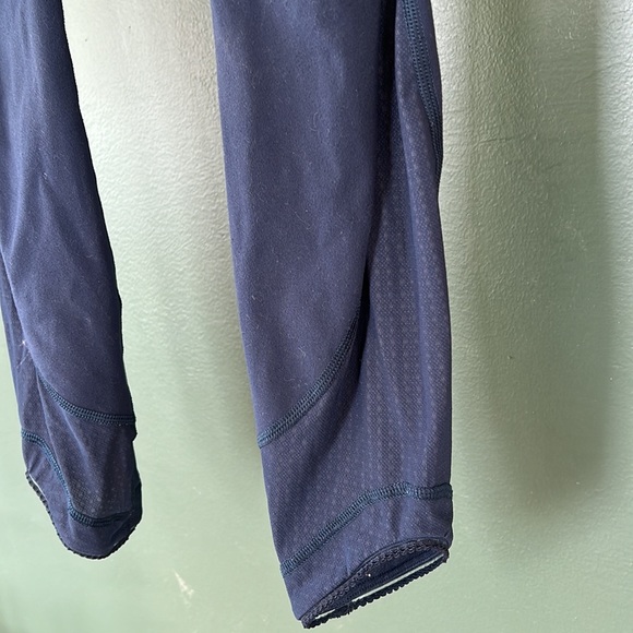 Lululemon Leggings. Size 2. Fixed hole in mesh panel (pictured). Navy Blue. - Picture 2 of 8